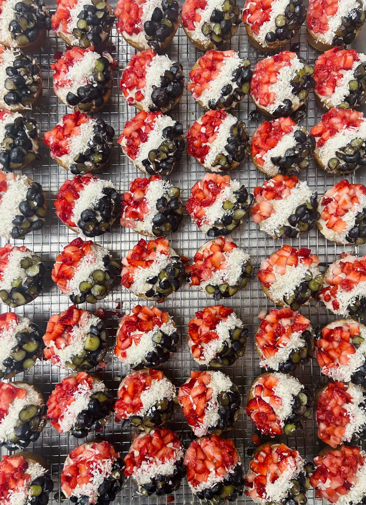 red, white, and blueberry muffins