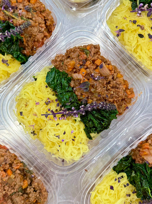lentil bolognese with spaghetti squash and garlicky kale