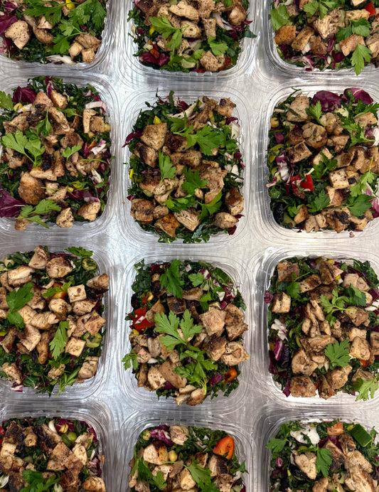 italian chopped kale salad with charred chicken and zesty vinaigrette