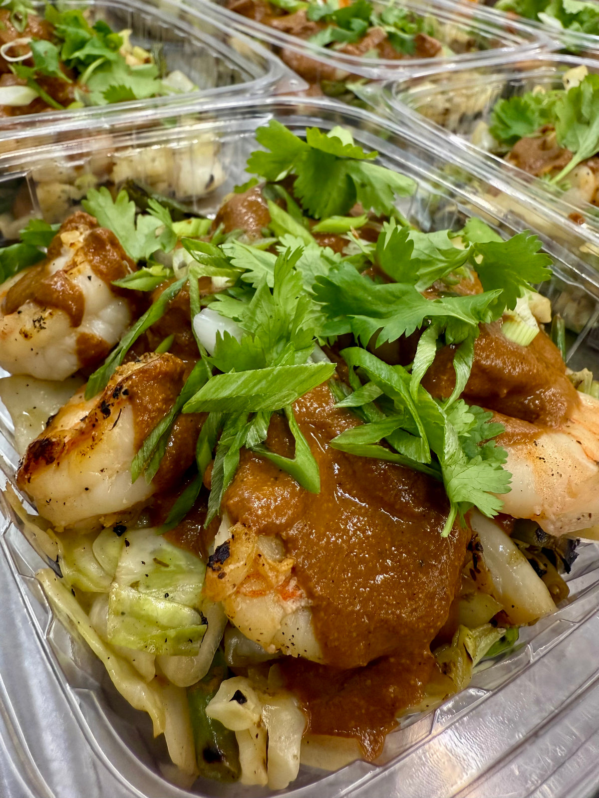 modican mole shrimp with cumin potatoes, charred cabbage, rainbow peppers