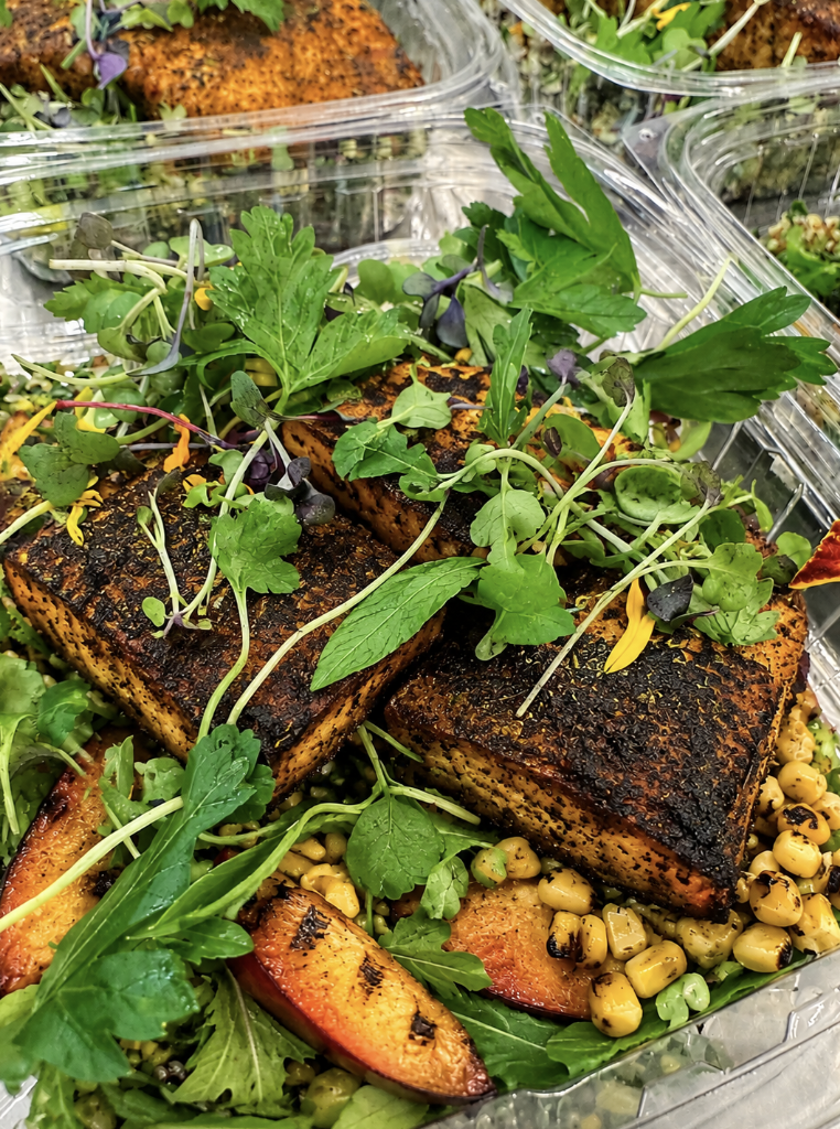 blackened tofu with grilled nectarines, corn + chicories