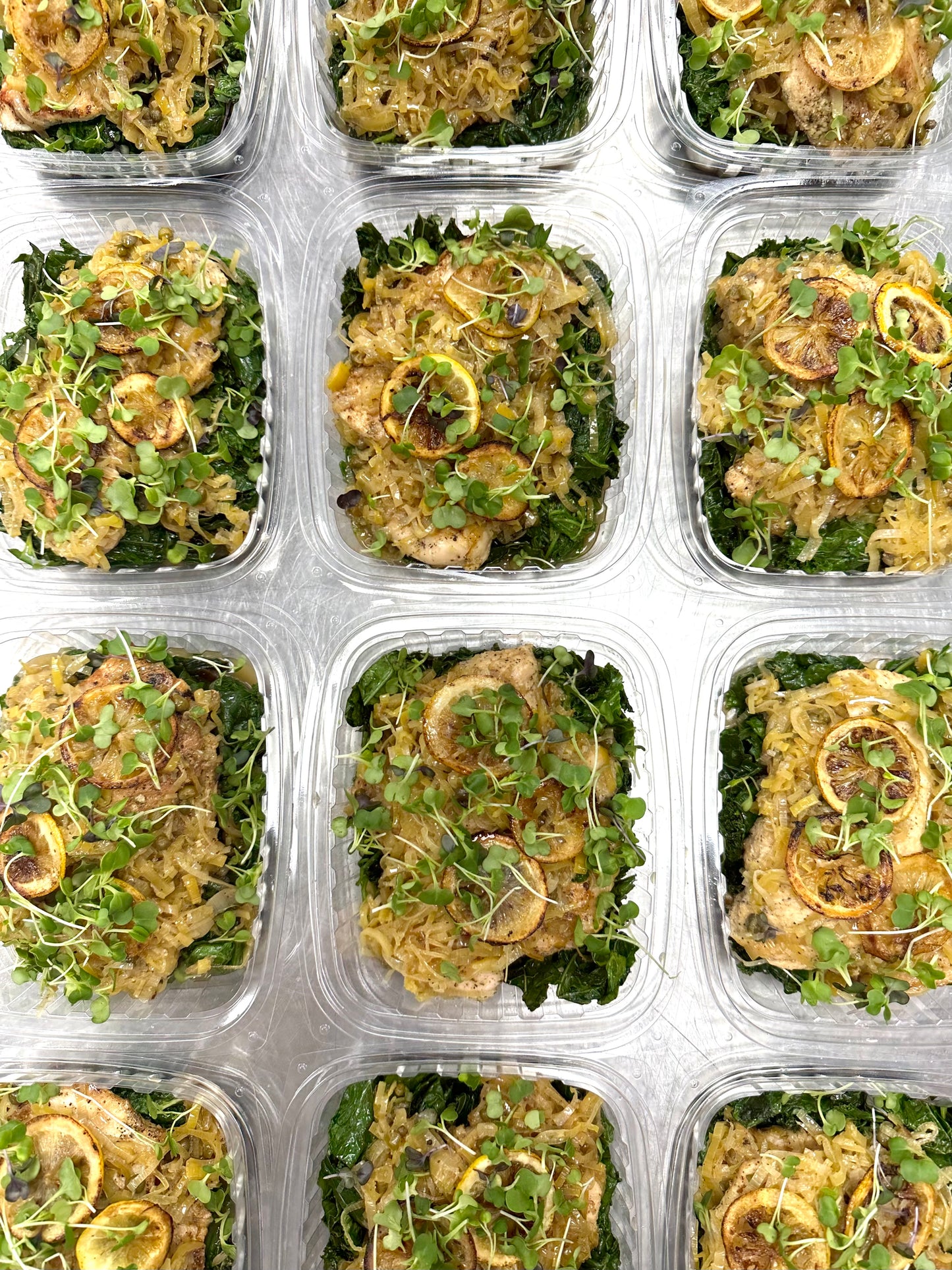 chicken piccata with sautéed mixed greens