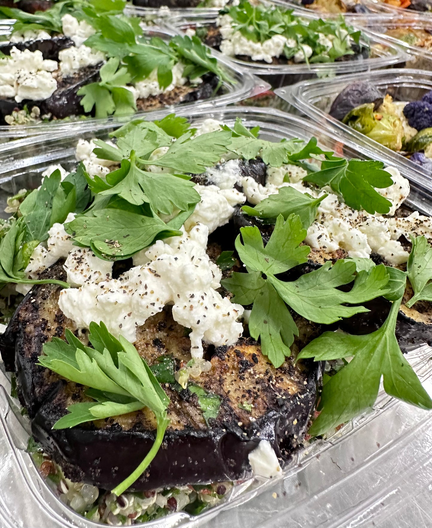 quinoa tabouli with grilled eggplant, feta, black lentils, lemon tahini dip